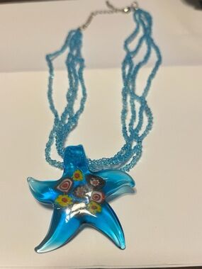 EUC Glass Beaded Unbraided Light Blue Necklace with Aqua Blue Star Fish Pendant